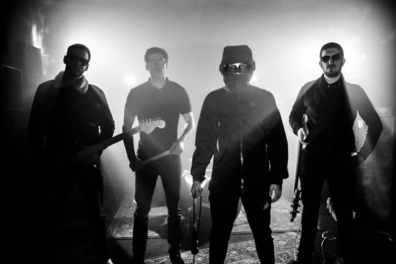 Mickey 9s, the four members; St. Cool in the mask